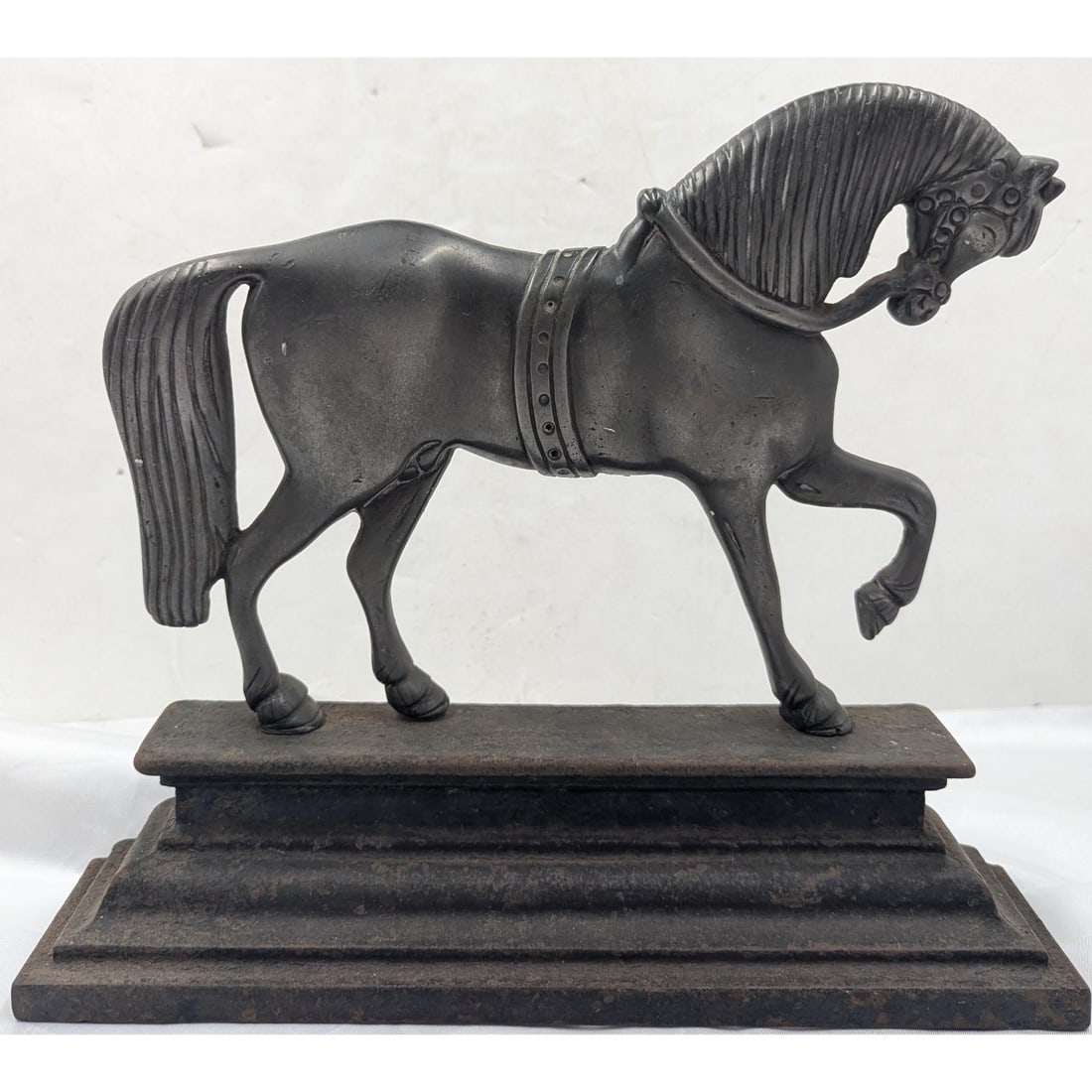 Antique Mixed Metal Horse Doorstop: Antique Mixed Metal Horse Doorstop. The bottom appears to be cast iron but we are unsure of the horse itself. Measures approx. 10" and 11 3/4". Please copy and paste the URL link below to