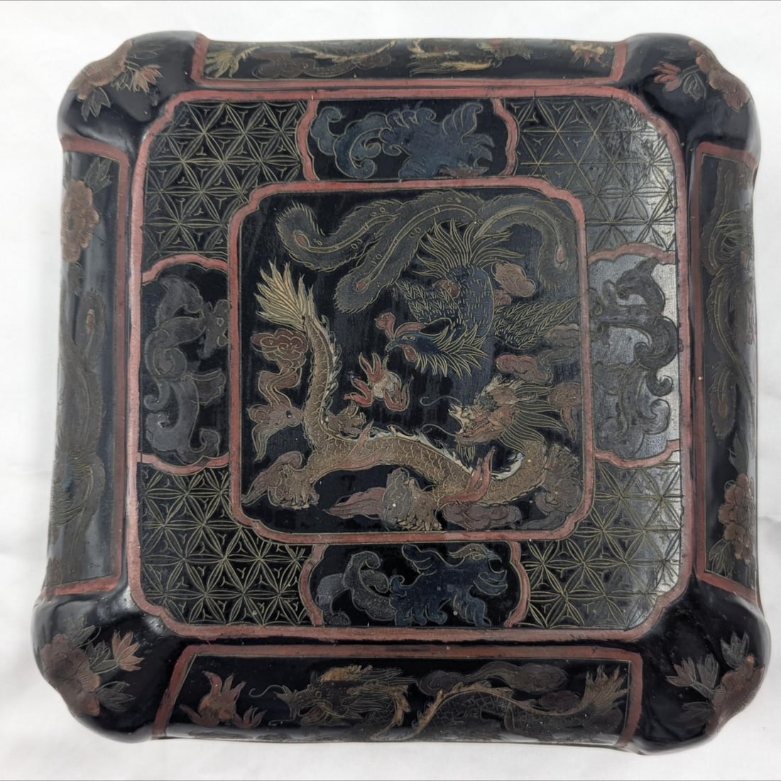 An Old Chinese Black Lacquered Trinket Box Decorated With Dragons, Flora, And Phoenixes (1 of 8)