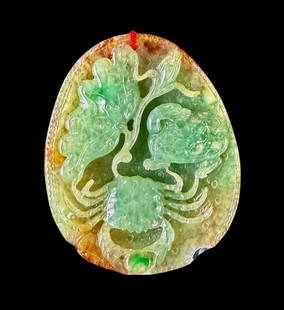 A Very Fine Carved Chinese Jadeite Pebble: Chinese carved jadeite pebble depicting a crab amongst lotus tendrils. Measures 2.5" x 2". Please READ & REVIEW our Terms and Conditions before bidding, payment, shipping and other specifics for the a
