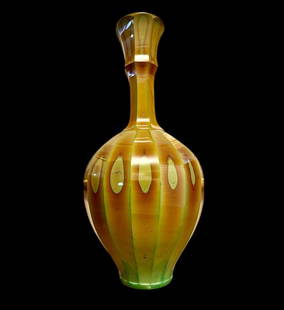 RARE Friedrich Egermann Faceted Lithyalin Glass Vase: 1840 RARE Friedrich Egermann (Czech 1777-1864) Faceted Lithyalin Glass Vase. Measures 16" tall. 14 faceted sides Lithyalin glass vase. Exceedingly rare emulating polished stone. Friedrich Egermann was