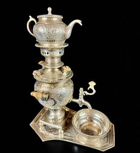 Antique Persian Hand Chased Sterling Silver Samovar, 1070 Grams: ***DUE TO THIS LOT BEING SILVER IT MUST BE PAID VIA BANK WIRE TRANSFER OR CERTIFIED CHECK.*** Spectacular antique sterling silver Persian samovar with complete and matching chased under tray, teapot a