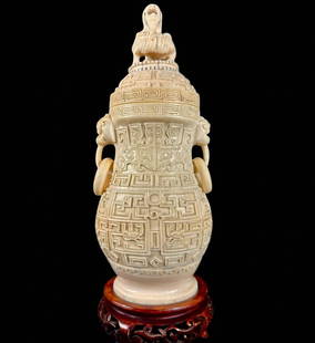 Amazing Antique Chinese 19th Century Bone Carved Lidded Vessel: Amazing antique Chinese 19th century bone carved lidded vessel with high relief and loose rings. Excellent condition. Measures 11.5" tall overall. Please READ & REVIEW our Terms and Conditions before