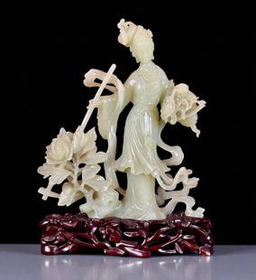 Antique Chinese Carved Jade Maiden With Flowing Garments And Floral Bouquet With Staff: Antique Chinese jade carved maiden with flowing garments and floral bouquet with staff. Masterfully executed out of celadon nephrite material. Measures 8" tall overall and 6" wide. Excellent condition