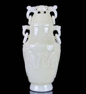 A Very Fine Chinese Carved Jade Lidded Vase With Four Loose Rings, Amazing Quality: Finely carved lidded jade vase with four loose rings. Pure even toned material. Stand 8" tall and 4" wide. Excellent condition. Please READ & REVIEW our Terms and Conditions before bidding, payment, s