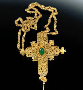 A Magnificent Filligree Cross Necklace Open Works: *** DUE TO THIS LOT BEING GOLD / JEWELRY IT MUST BE PAID VIA BANK WIRE TRANSFER OR CERTIFIED CHECK.*** Wonderful filigree cross necklace. Cross opens with pin to reveal compartment. Overall length 20"