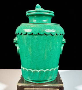 A Fine Antique Green Glazed Chinese Lidded Jar, Yixing Clay With Impressed Mark: Antique Chinese green glazed lidded jar decorated with double lion heads and a crouching beast finial topped lid. Marked with a “CHINA” export stamp and an impressed makers mark, for the