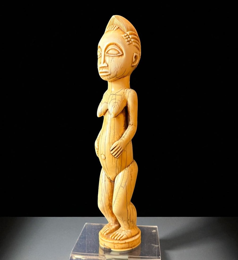 Exceedingly RARE And Museum Quality Tabwa Mipasi Ancestor Bone Figure: Tabwa Mipasi ancestor bone figure, likely originating from the Democratic Republic of Congo. Stands 10.75" tall. Exceedingly Rare and in excellent condition. Please READ & REVIEW our Terms and Conditi