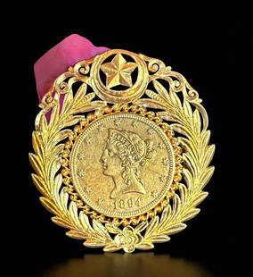 Rare 1894 American Gold Coin Embellished With High Karat Gold Bale: **DUE TO THIS LOT BEING GOLD IT MUST BE PAID VIA BANK WIRE TRANSFER OR CERTIFIED CHECK.** Rare 1894 American Gold Coin Embellished With High Karat Gold Bale. From same collection. Most likely made by