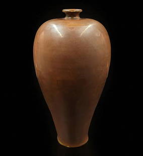 A Persimmon-Glazed Chinese Meiping Vase Qing Dynasty: A Persimmon-Glazed Chinese Meiping Vase Qing Dynasty. Measure 12 1/4" Tall. Provenance: Private Estate. Please READ & REVIEW our Terms and Conditions before bidding, payment, shipping and other specif