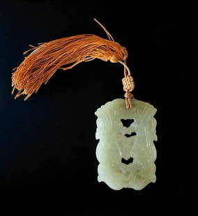 An Antique Chinese Jade Pendant: An Antique Chinese Jade Pendant. Measures approximately 2-1/4" x 1-1/2" Please copy and paste the URL link below to review our Terms and Conditions for bidding, payment, shipping and othe