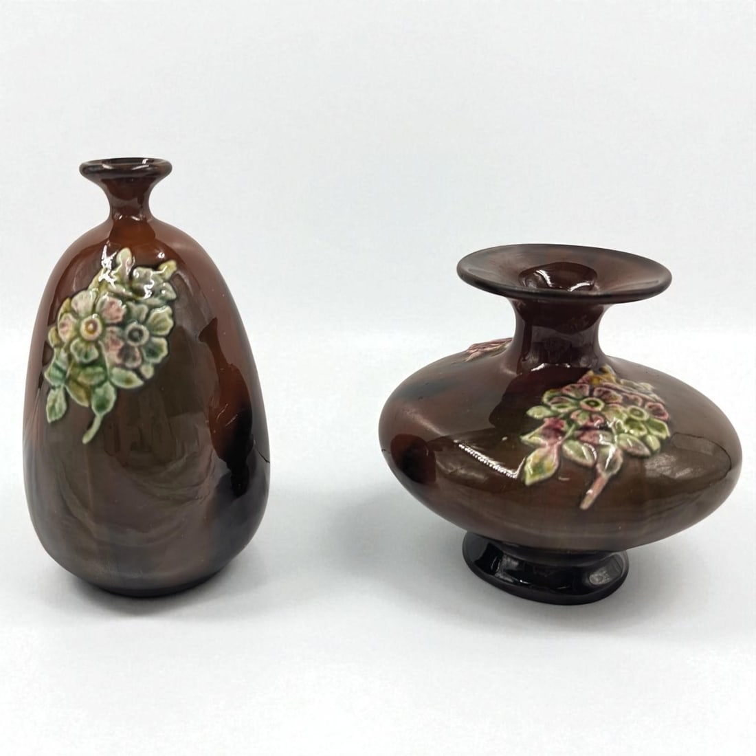 Pair Of Antique Peter & Reed Majolica Pottery Vases: Pair Of Antique Peter & Reed Majolica Pottery Vases. Measures approx. 5" and 6 1/2" tall. Please copy and paste the URL link below to review our Terms and Conditions for bidding, payment,