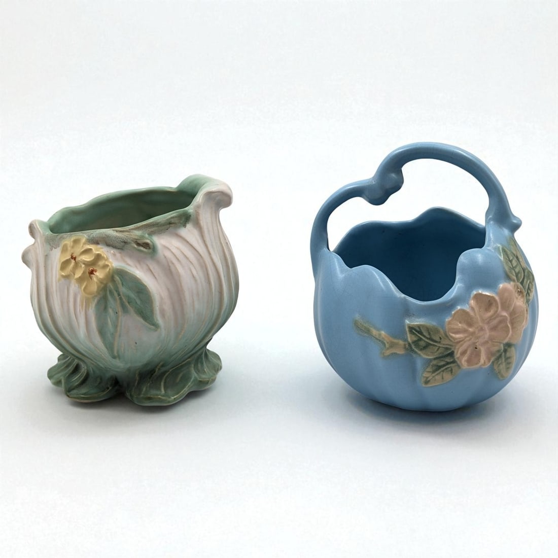 Pair Of Vintage Weller Pottery Pieces, Roba R-5 Cache Pot And Matte Blue Blossom Basket: Pair Of Vintage Weller Pottery Pieces, Roba R-5 Cache Pot And Matte Blue Blossom Basket. Measures approx. 5" X 5" and 6" X 5". Please copy and paste the URL link below to review our Terms