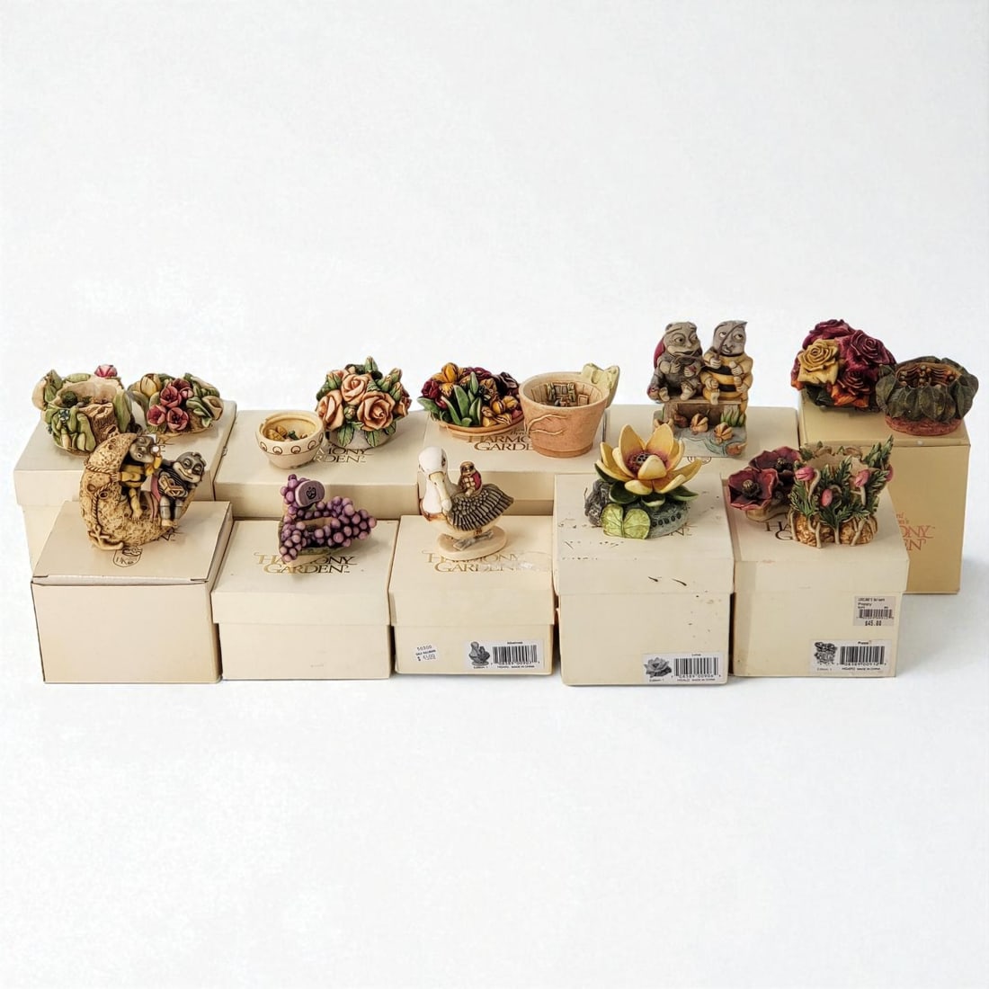 Lot Of 10 Lord Byron's Harmony Garden Trinket Box Figurines: Lot Of 10 Lord Byron's Harmony Garden Trinket Box Figurines. Please note that one of the figures has been chipped, see images # 2 and 3. Please copy and paste the URL link below to review