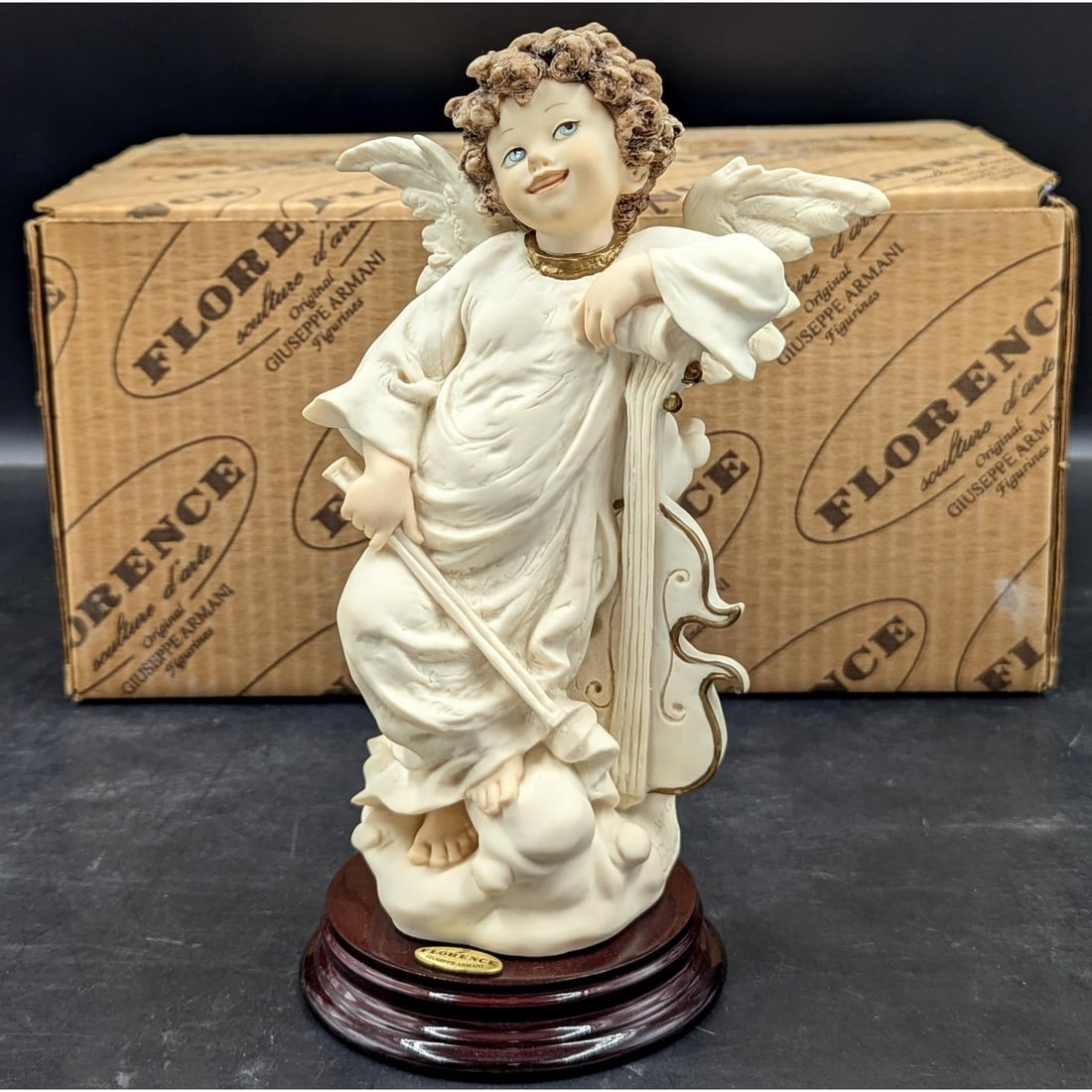 Giuseppe Armani Figurine: "Heavenly Harmony" 1283F With Original Box: Giuseppe Armani Figurine: "Heavenly Harmony" 1283F With Original Box. Box measures approx. 8" X 11 1/2" X 6". Please copy and paste the URL link below to review our Terms and Conditions