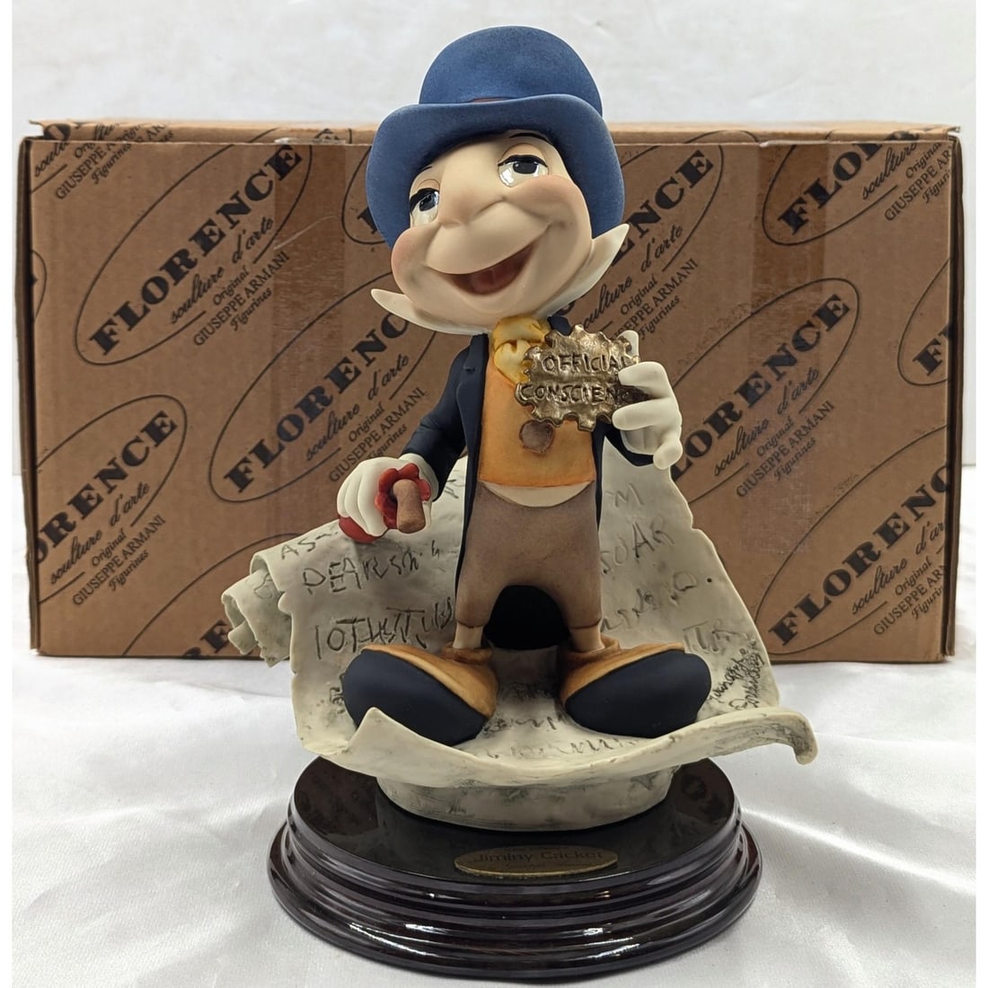 Giuseppe Armani Figurine: Walt Disney "Jiminy Cricket" 379C With Original Box: Giuseppe Armani Figurine: Walt Disney "Jiminy Cricket" 379C With Original Box. Box measures approx. 7" X 13" X 8". Please copy and paste the URL link below to review our Terms and Condit