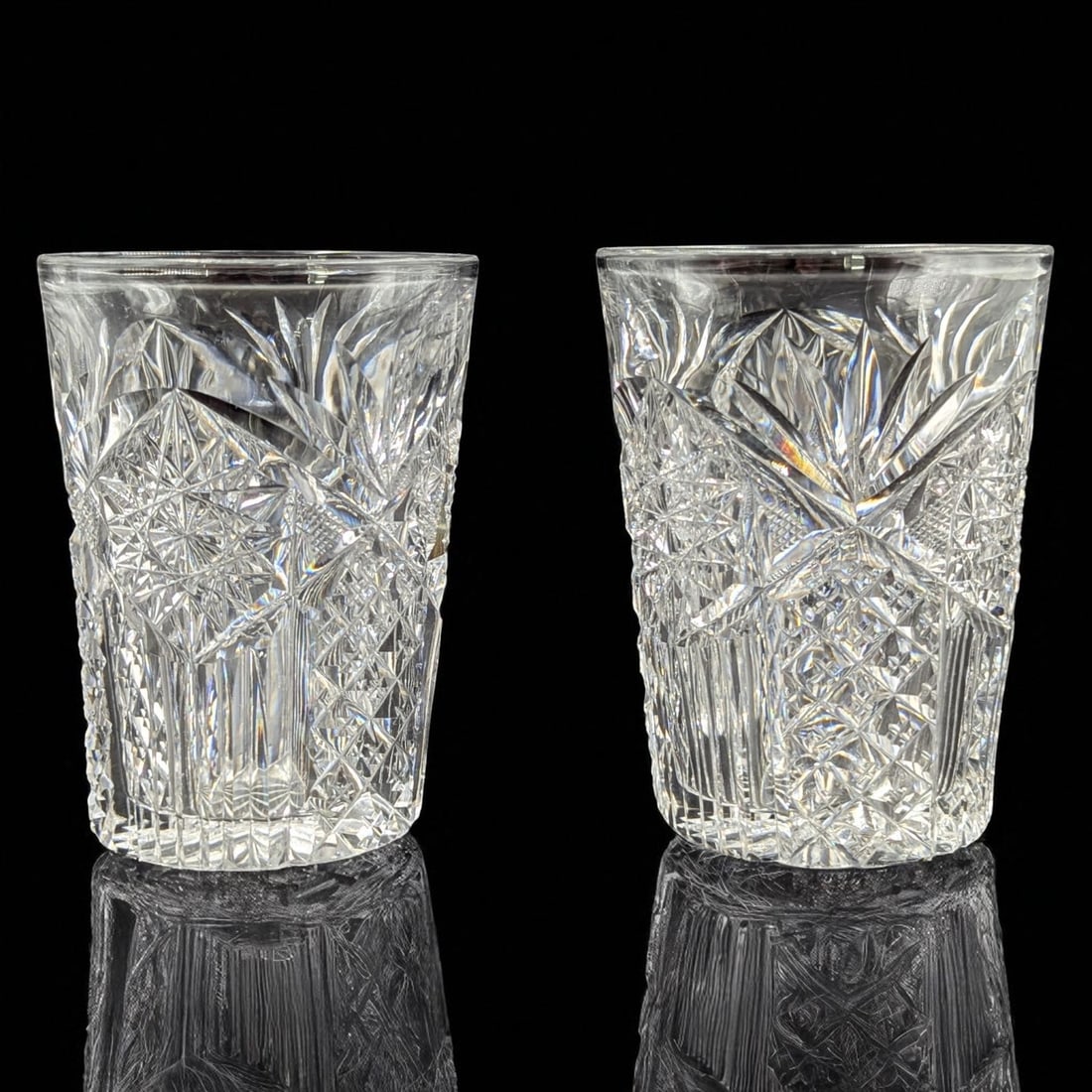 Pair Of Vintage American Brilliant Period Cut Glass Tumblers, Signed Libbey: Pair Of Vintage American Brilliant Period Cut Glass Tumblers, Signed Libbey. PLEASE NOTE, there are two small flecks on the bottom of the tumblers, please see pics. Measures approx. 4" X 3" each.