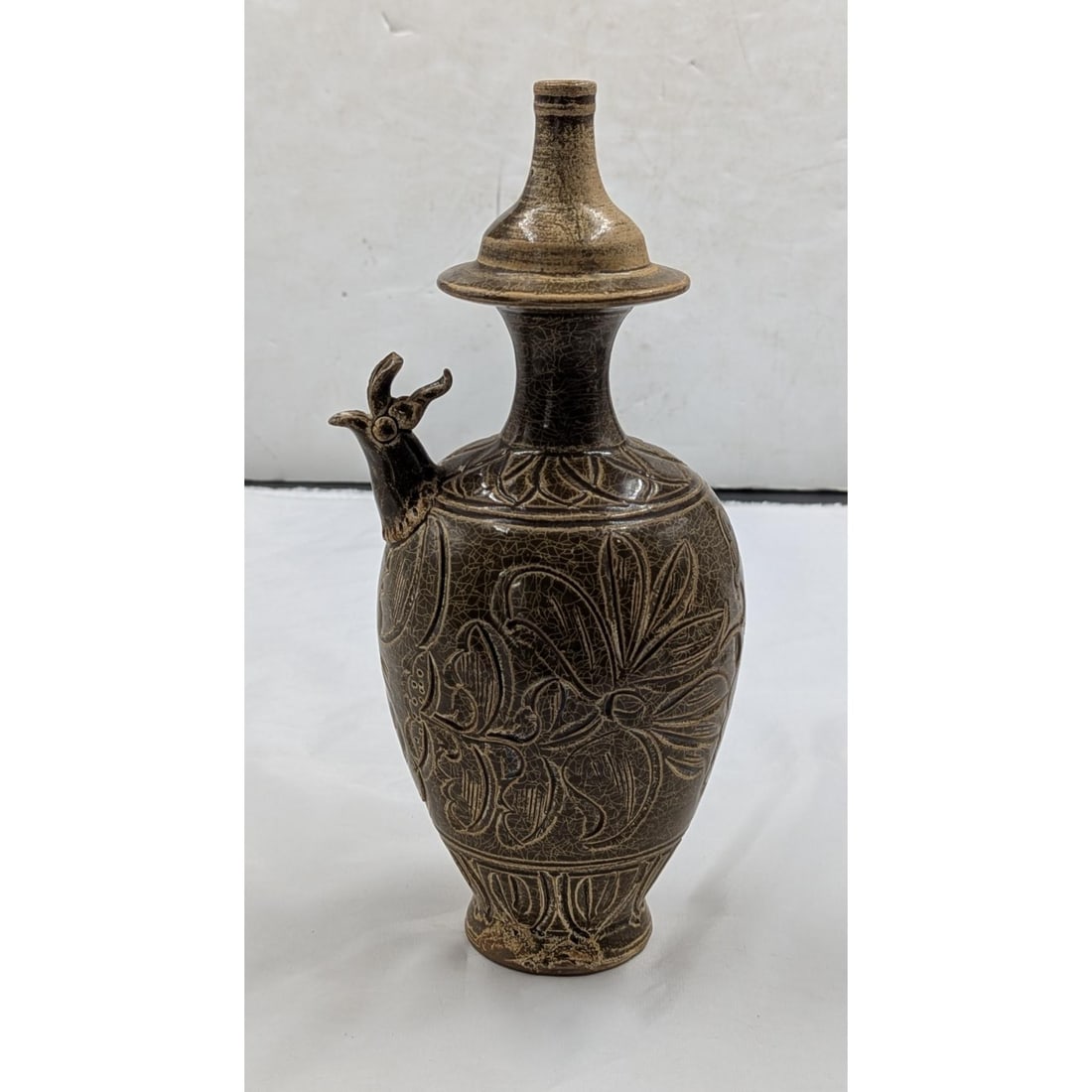 A Chinese Song Style Yao Zhou Flower Carving Porcelain Ewer (1 of 14)