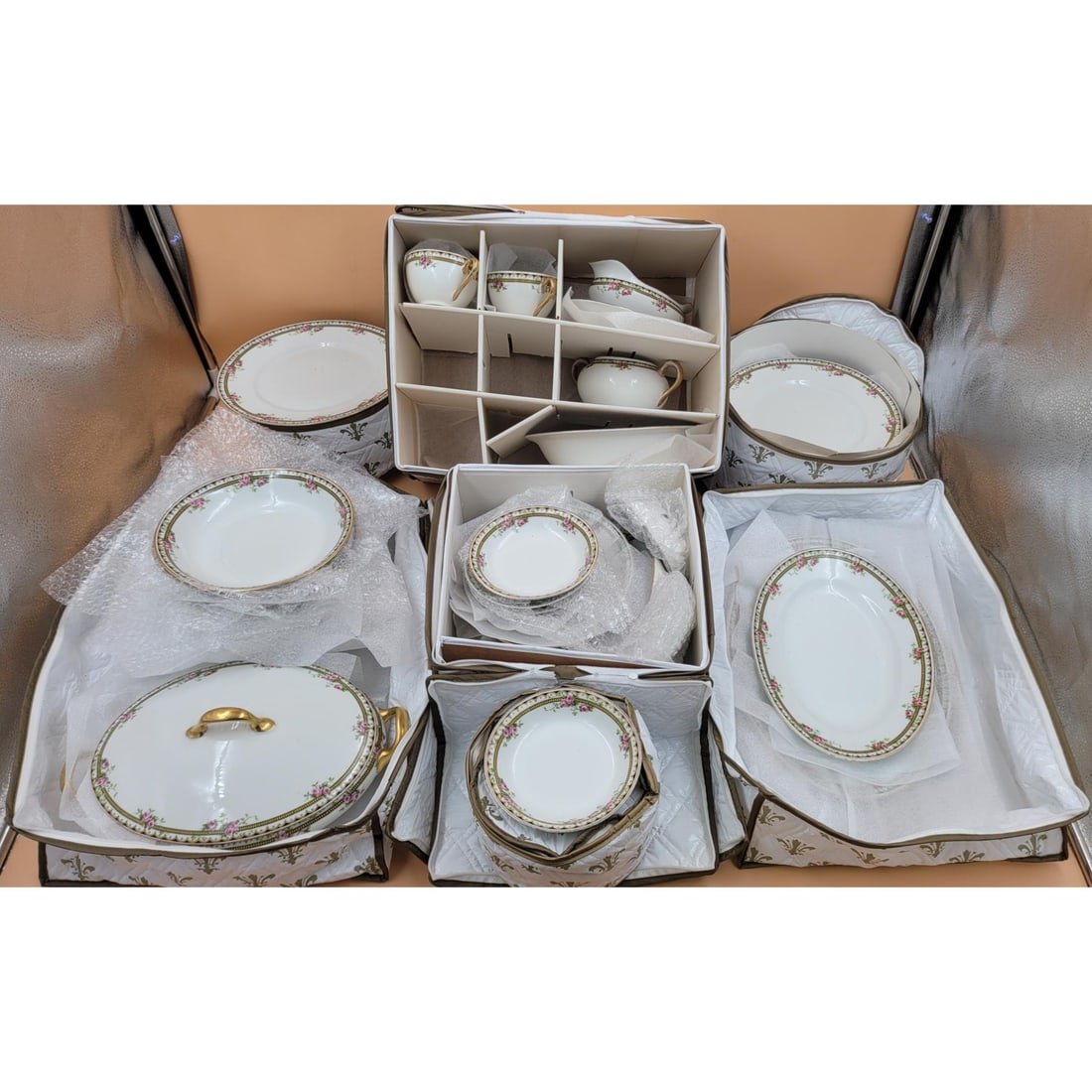 Collection Of Limoges Porcelain Serveware Set With Cases: Collection Of Limoges Porcelain Serveware Set With Cases. There are multiple dishes that have a chip in them. Please copy and paste the URL link below to review our Terms and Conditions fo