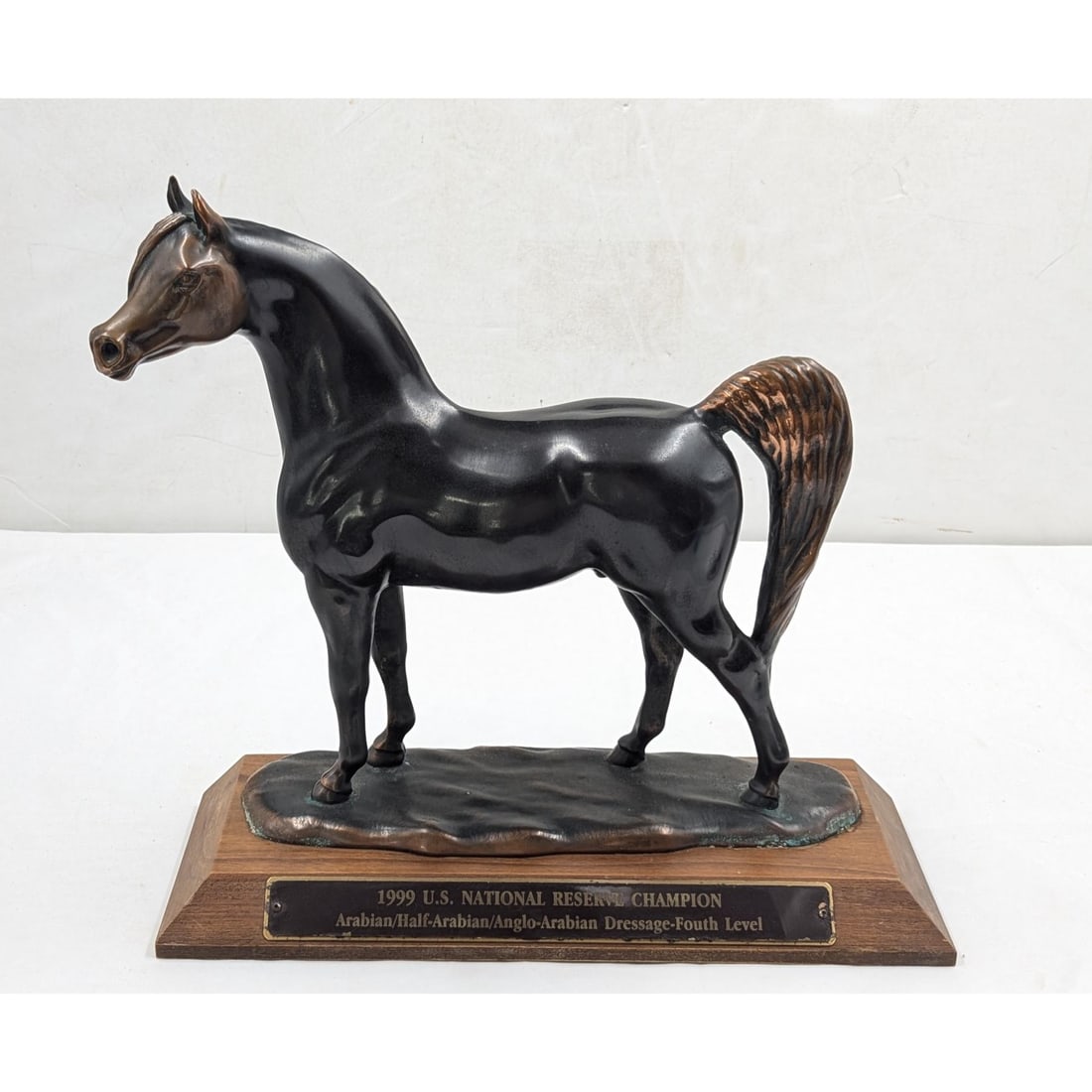 1999 Unsigned National Reserve Champion Trophy: 1999 Unsigned National Reserve Champion Trophy. Measures approx. 14" X 5" X 13 1/2". Please copy and paste the URL link below to review our Terms and Conditions for bidding, payment, ship