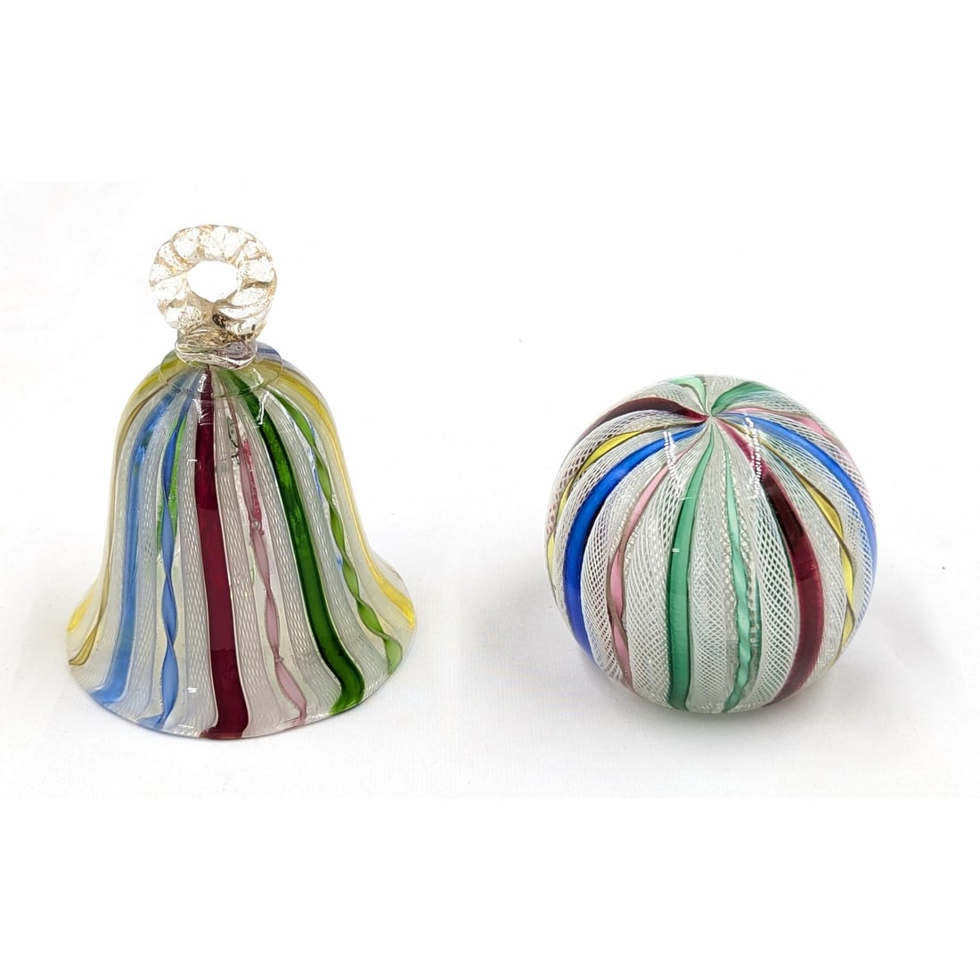 Lot Of 2 Italian Murano Ribbon Latticino Glass Pieces, Includes A Paperweight And Ringing Bell: Lot Of 2 Italian Murano Ribbon Latticino Glass Pieces, Includes A Paperweight And Ringing Bell. Measures approx. 2 3/4" X 2 1/2" and 4 1/2" X 3 1/4". Please copy and paste the URL link