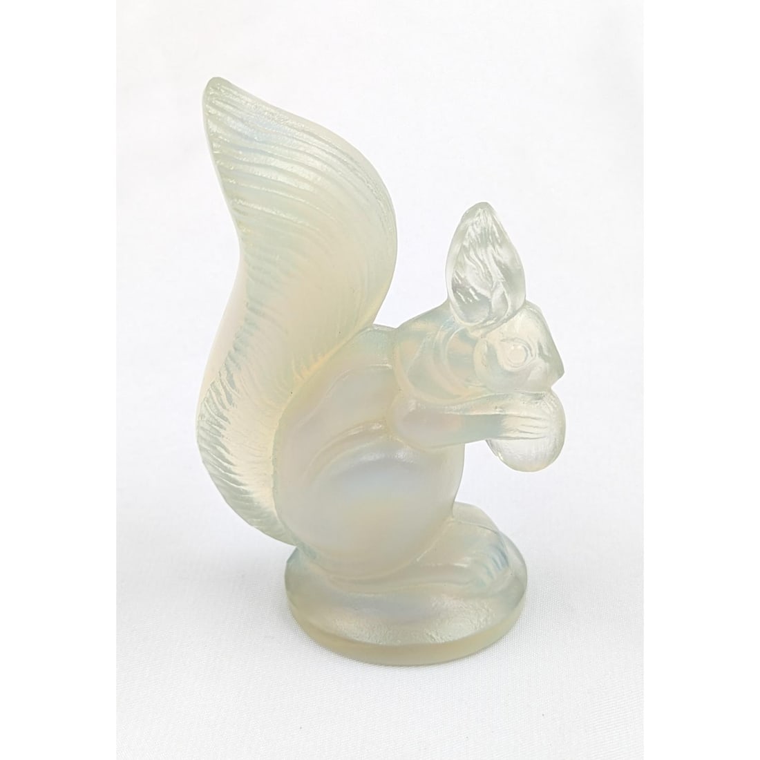 A Vintage French Sabino Opalescent Glass Squirrel Figure: A Vintage French Sabino Opalescent Glass Squirrel Figure. Measures approx. 3" X 2". Please copy and paste the URL link below to review our Terms and Conditions for bidding, payment, sh