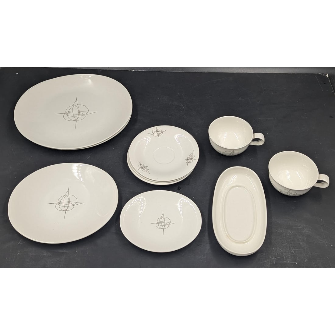 10 Piece Lot Of Eva Zeisel (Hungarian, 1906-2011) Hallcraft Fantasy China: 10 Piece Lot Of Eva Zeisel (Hungarian, 1906-2011) Hallcraft Fantasy China. Pieces measure approx. 5 1/2" X 6 1/2", 4 1/2" X 8 1/4", 7 3/4" X 8 3/4", 10 1/4" X 11", 4" X 5" X 2 1/2", and 6 1/4" in diam