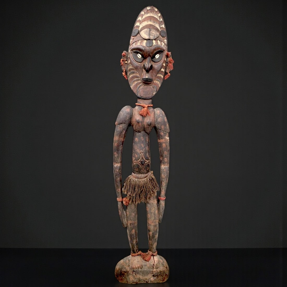 Large Antique Papua New Guinean Carved Wood Ancestral Totem Standing Figure: Large Antique Papua New Guinean Carved Wood Ancestral Totem Standing Figure. Measures approximately 52" x 11". Provenance: Artifacts were acquired from a private estate in South Florida. The estate ow