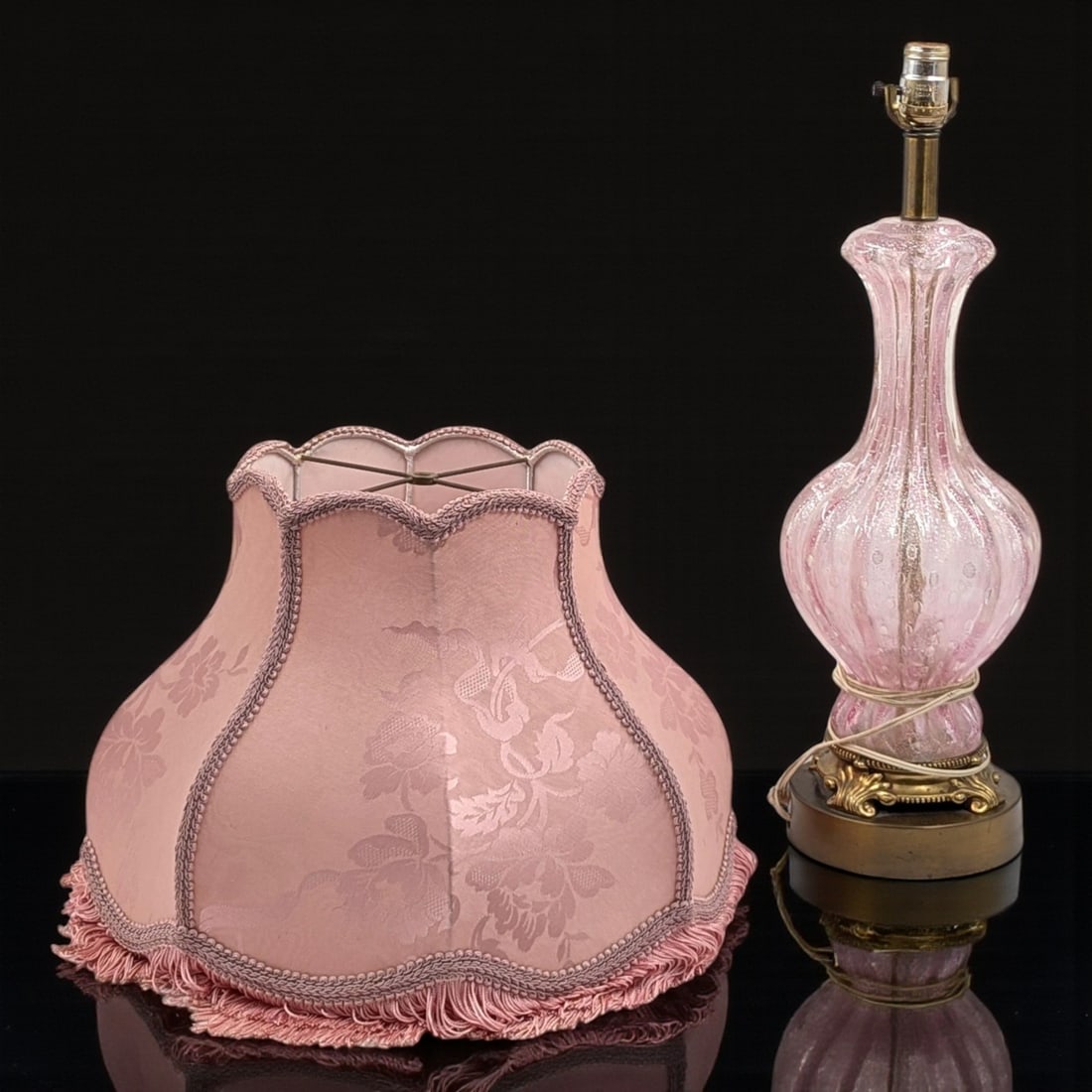 A Beautiful Vintage Pink Murano Glass Lamp With Lampshade: A Beautiful Vintage Pink Murano Glass Lamp With Lampshade. Measures approx. 24" X 8", Lamp Shade measures approx. 12" X 17 1/2". Please copy and paste the URL link below to review our Term