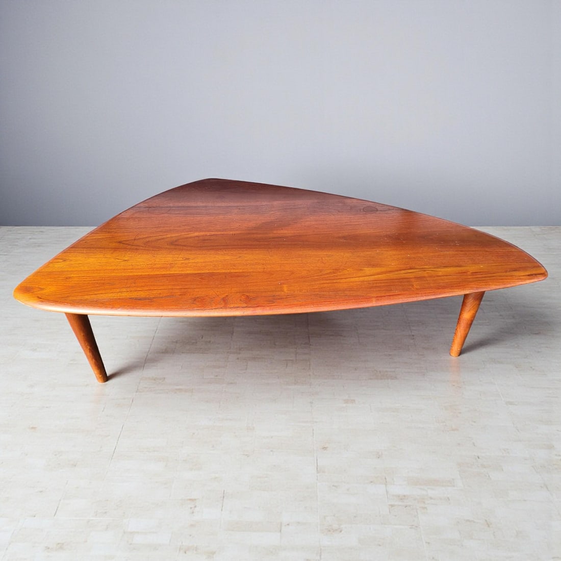 Danish Mid Century "Guitar Pick" Coffee Table: Danish Mid Century "Guitar Pick" Coffee Table. Measures approx 18.5" x 58" X 37" Please copy and paste the URL link below to review our Terms and Conditions for bidding, payment, shipping a