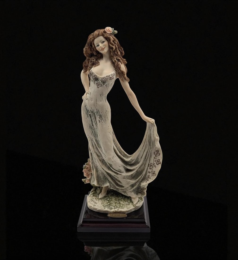 Giuseppe Armani Figurine: 10th Year Anniversary "Celebration" 1260C With Original Box: Giuseppe Armani Figurine: 10th Year Anniversary "Celebration" 1260C With Original Box. Box measures approx. 7 1/2" X 16" X 6". Provenance: A Single Central Florida Estate. Please copy and