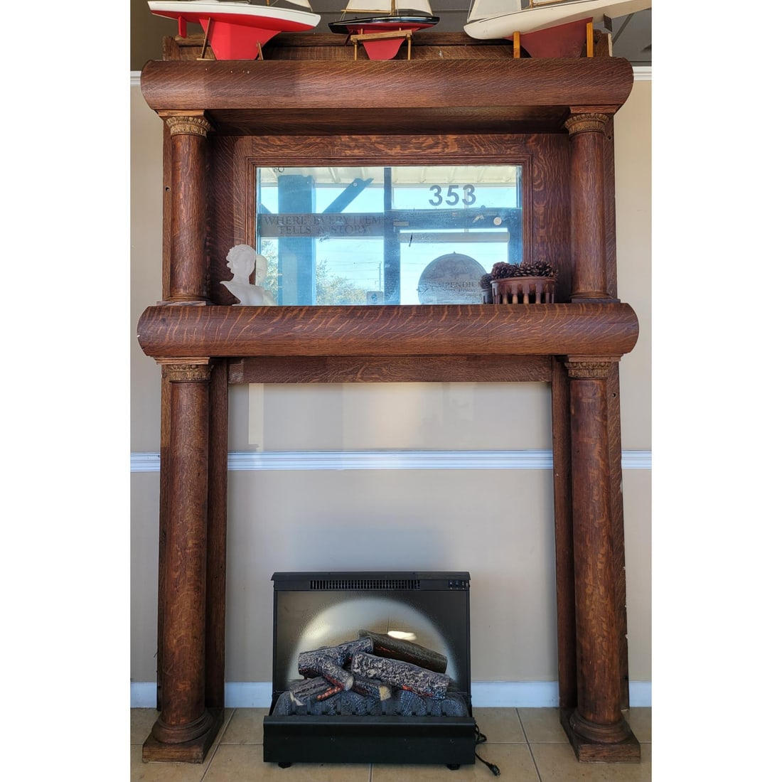 Mid Century Mirrored Fireplace Mantle: Mid Century Mirrored Fireplace Mantle. The decorations, heater, and sail boats are not included in the lot. Measures approx. 88.5" X 60.5" X 12.5" Please copy and paste the URL link below t