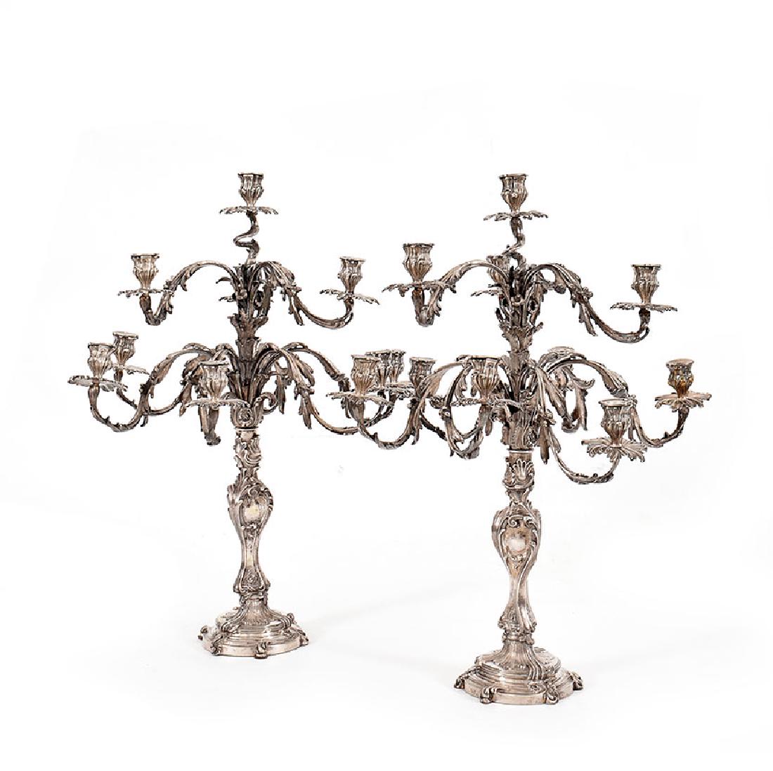 A pair of large Italian silver 10 branches candelabra: A pair of large Italian silver 10 branches candelabra, Messulam, lictor's fasces mark, 65,5cm. high, 16.000gr. circa total weight