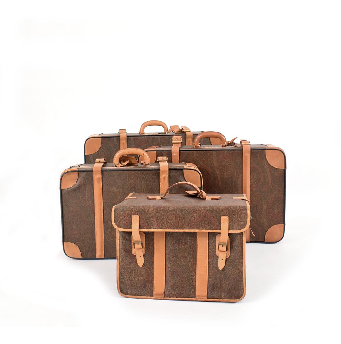 3 Etro suitcases and a shoe rack, Milan, '80s: from 31,5x45,5x30cm. to 23,5x77x51cm.