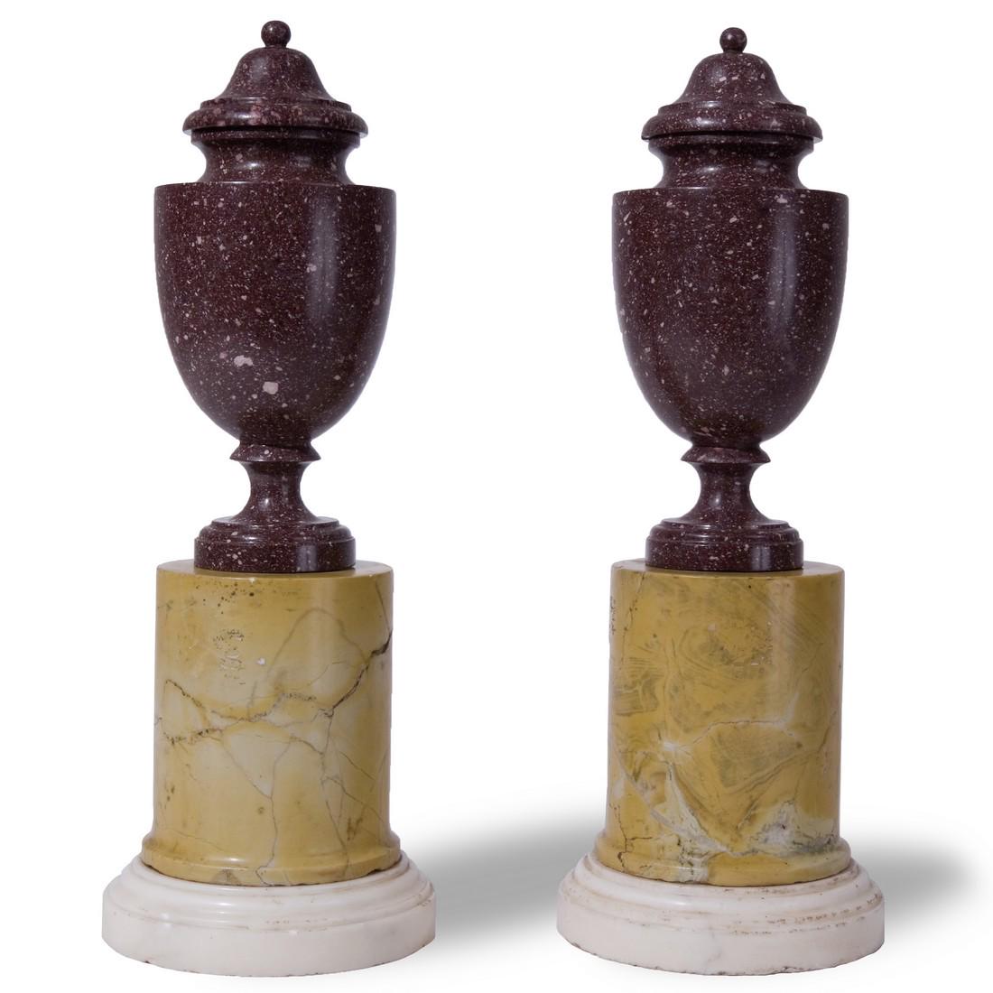 A pair of 19th century porphyry vases: on a giallo antico and white marble base, 32cm. total height