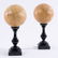 A pair of giallo di Siena marble spheres