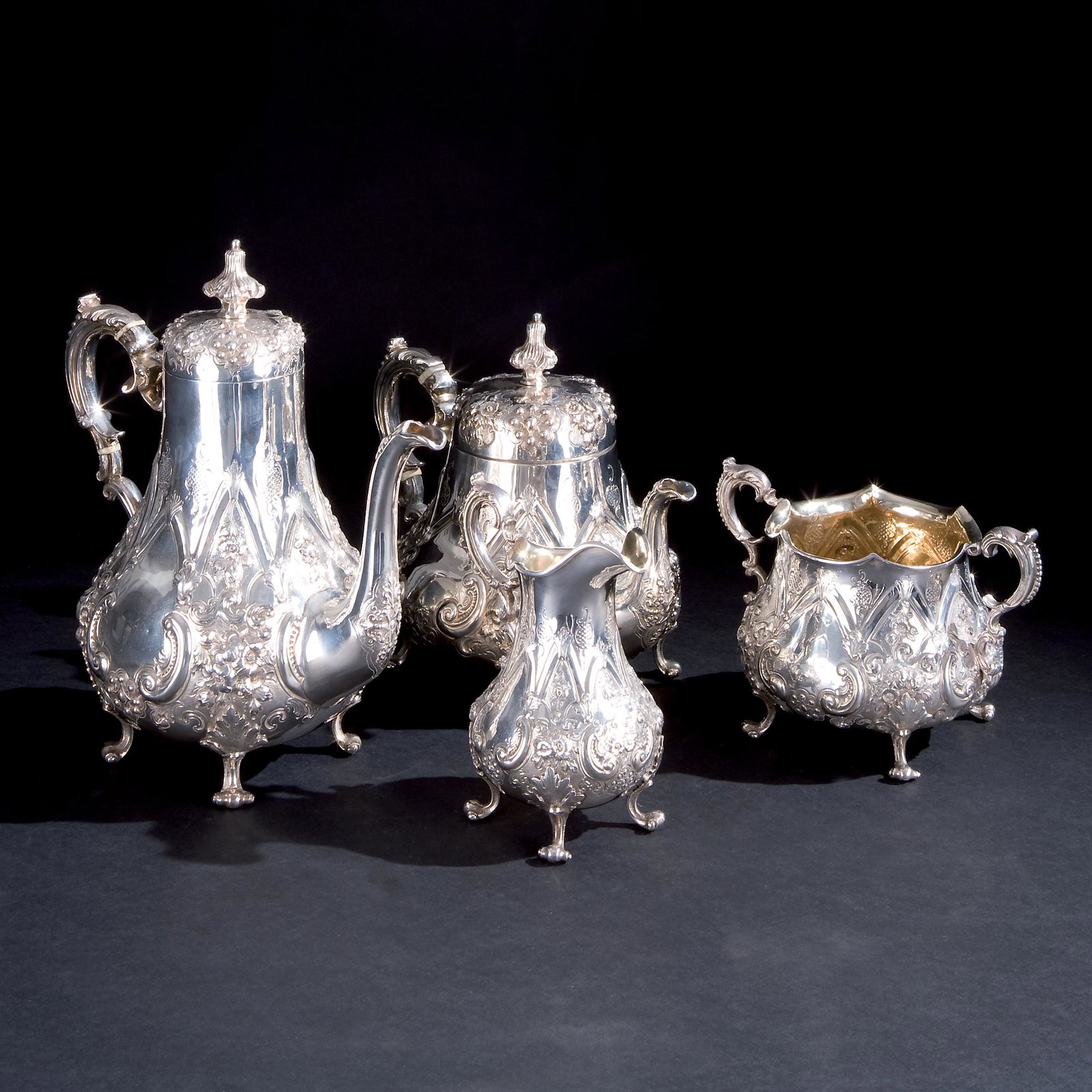A sterling silver tea and coffee service, London, 1866: comprising a teapot, a coffeepot, a milk jug and a sugar bowl, the coffeepot 27cm. high, 2.629gr. total weight