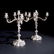 A pair of silver five-light candelabra