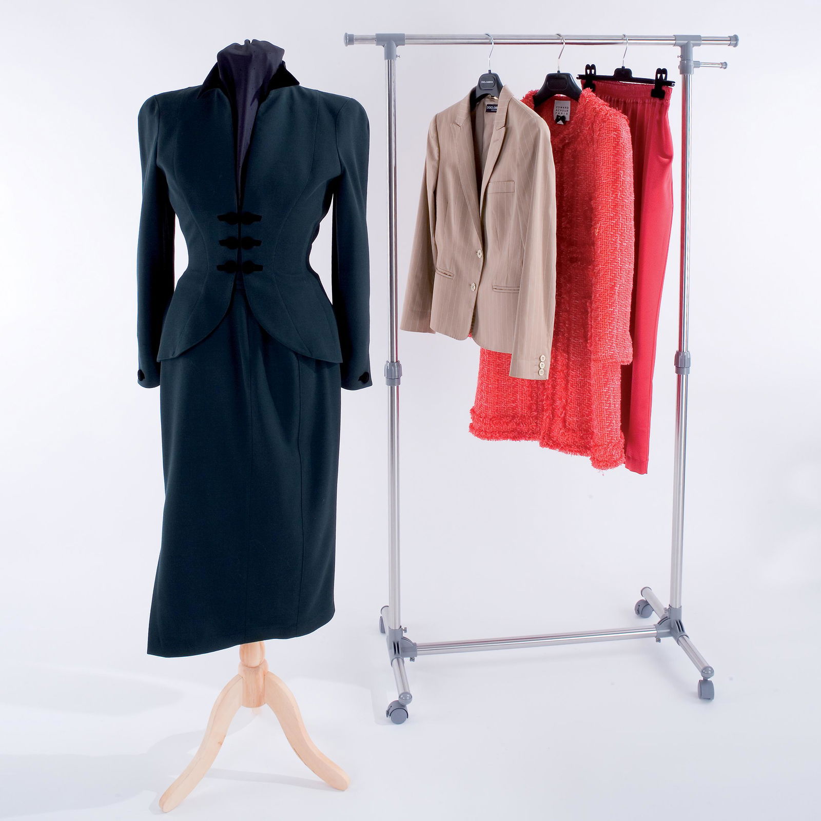 Thierry Mugler: a suit comprising a green jacket and skirt, size 38 TOGETHER WITH a Edward Achour red coat, a Dolce&Gabbana jacket and a red silk trouser