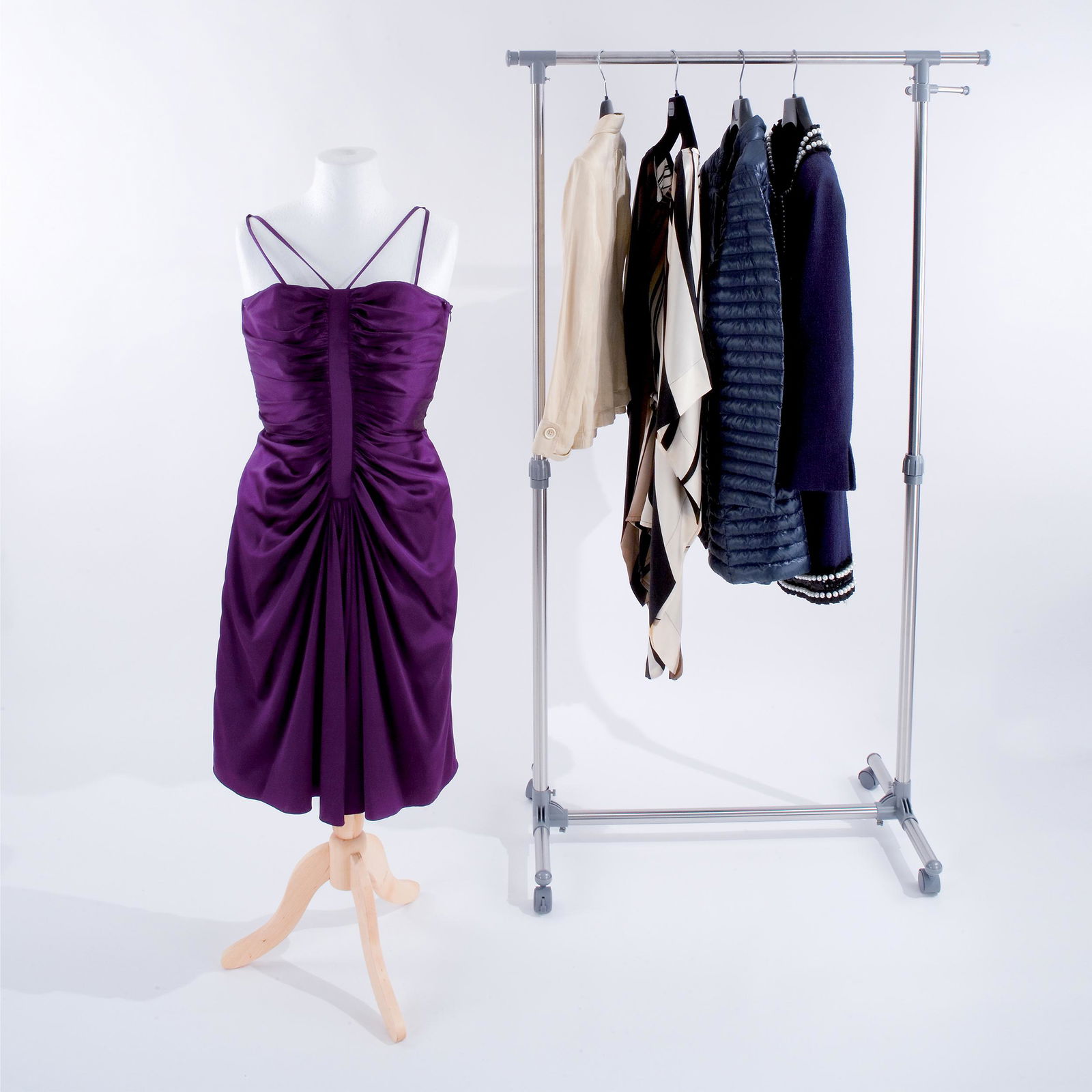 Edward Achour, a blue coat: size 42 TOGETHER WITH a DKNY beige jacket (size 4), a Herno long winter coat, a Adolfo Dominguez purple evening dress (size 38) and a blouse