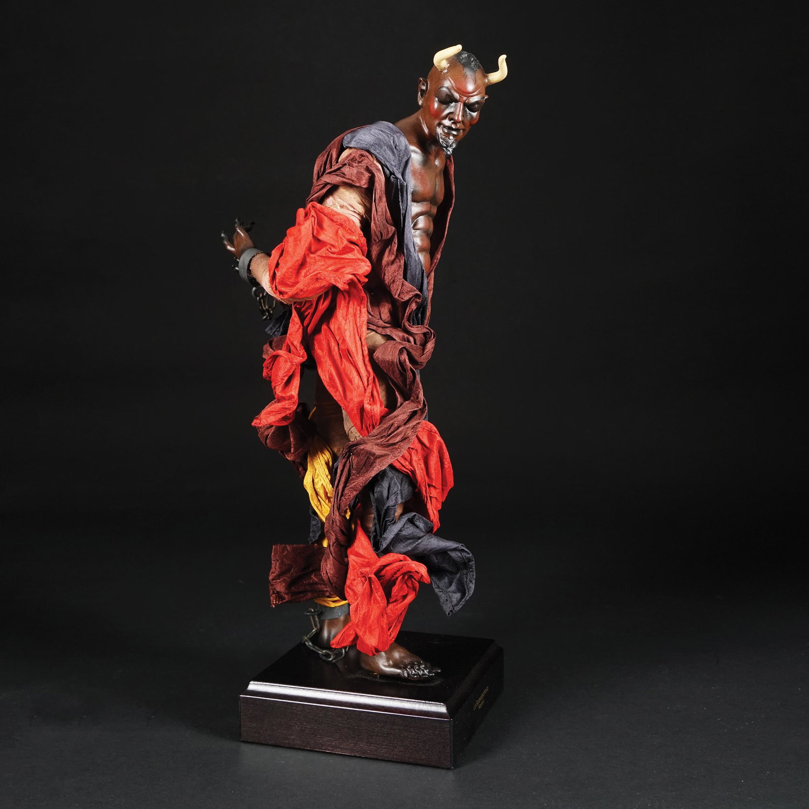 A polychrome terracotta, wire and tow devil (1 of 1)
