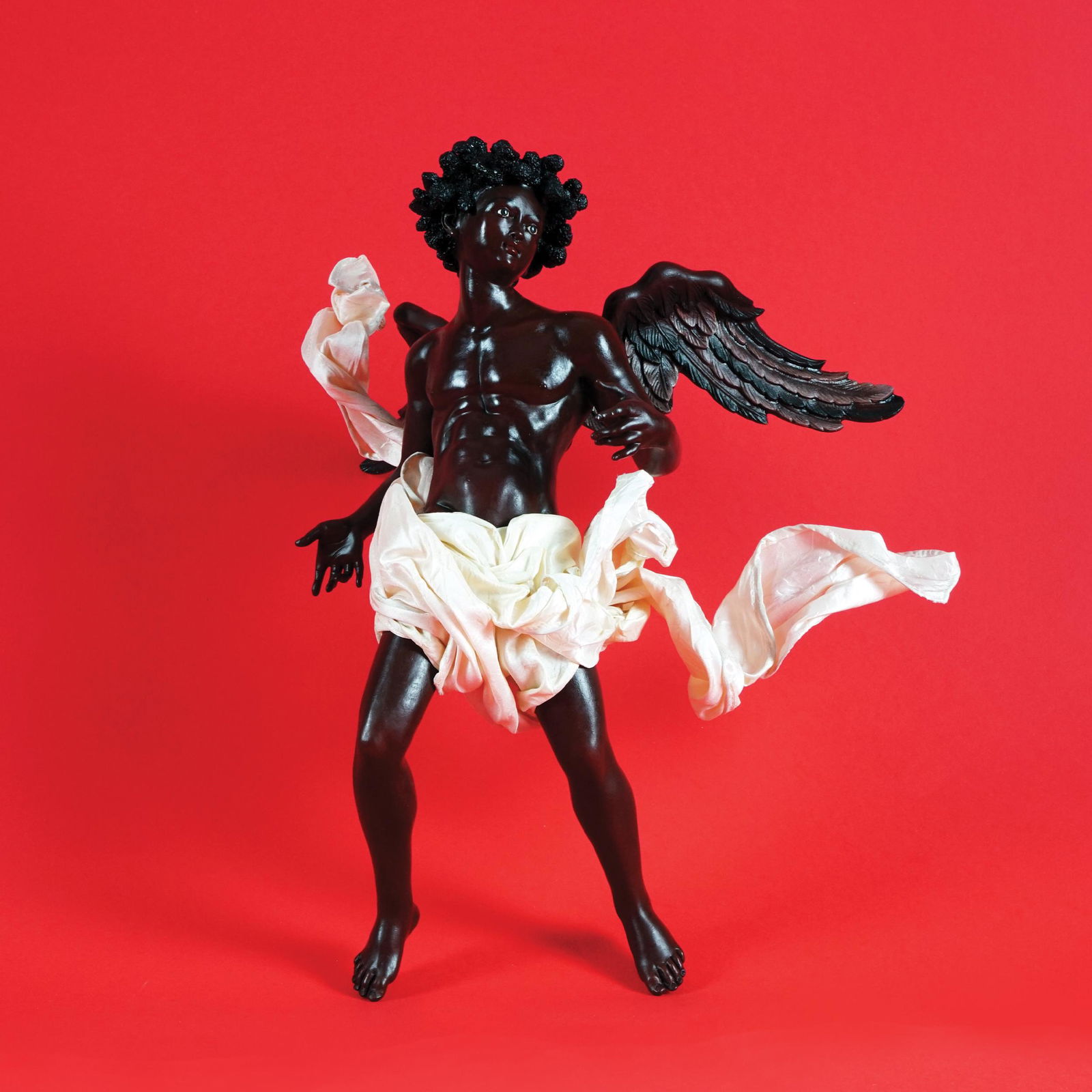 A Neapolitan polychrome terracotta dark-skinned angel (1 of 1)