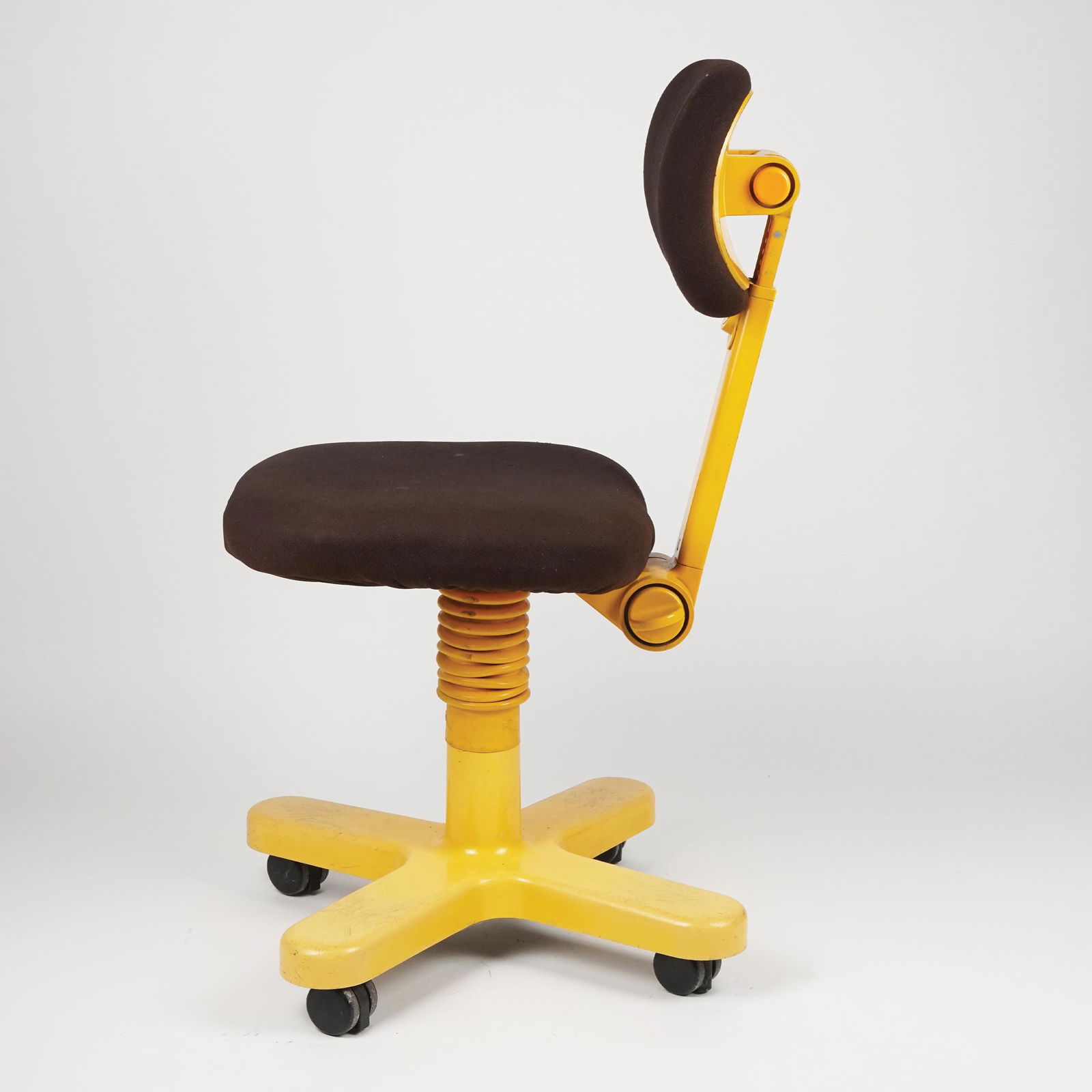 An Italian die-cast yellow aluminum: Ettore Sottsass for Olivetti, 83x40x43cm.