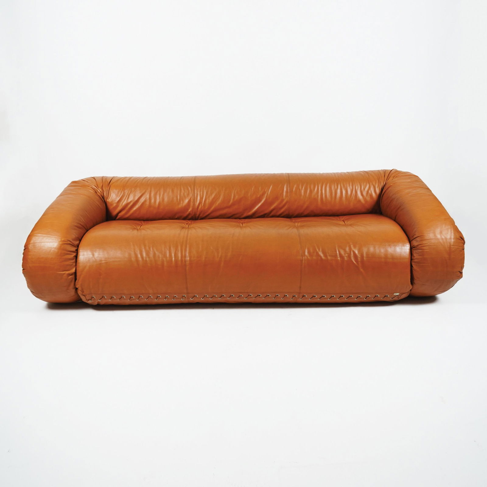 An Italian leather, polyurethane and steel sofa bed: Alessandro Becchi for Giovannetti, 1970, 65x240x85cm.