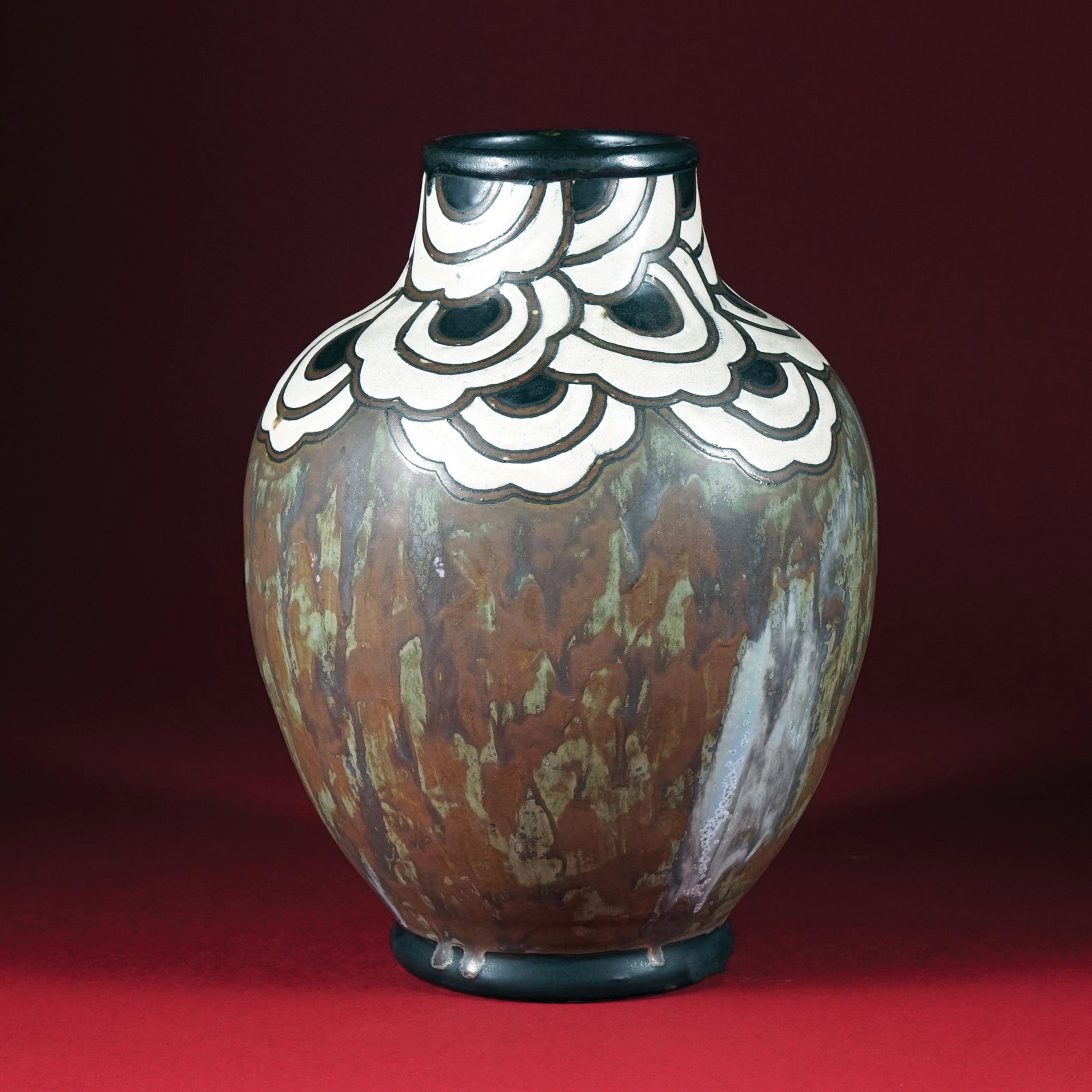 A Belgian brown and white ceramic vase, Boch FrÃ¨res: 29cm. high