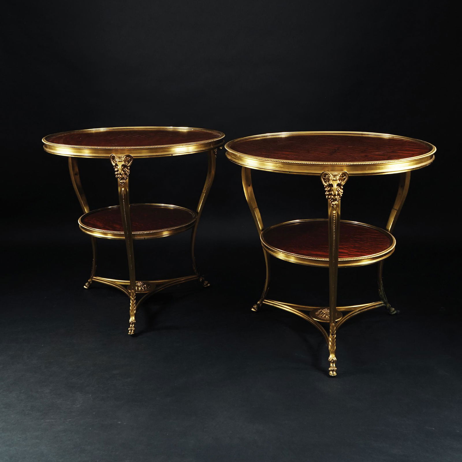 A pair of gilt bronze gueridons with round wood tops (1 of 1)