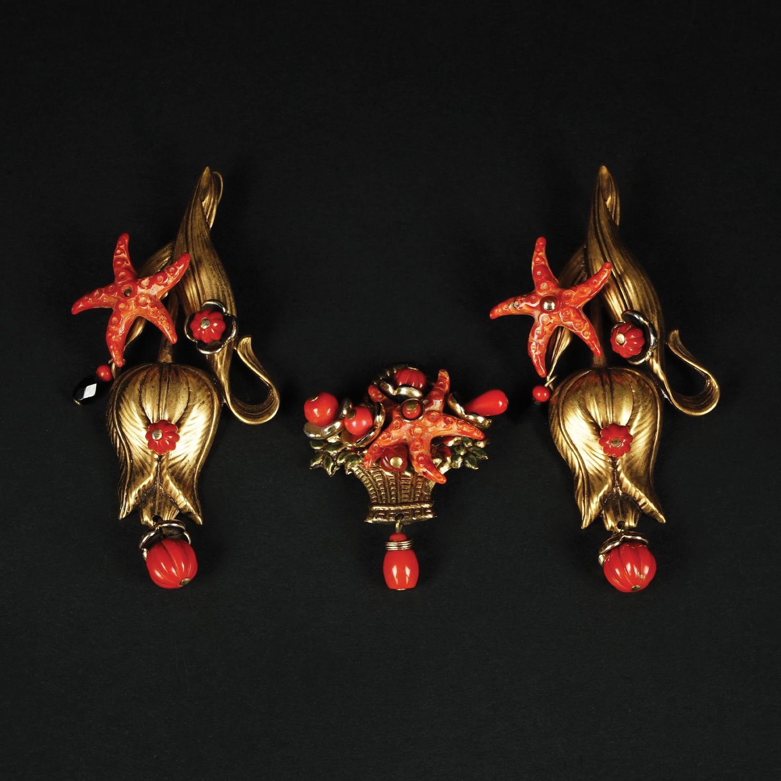 A gilt metal brooch and a pair of earrings with synthetic coral (1 of 1)