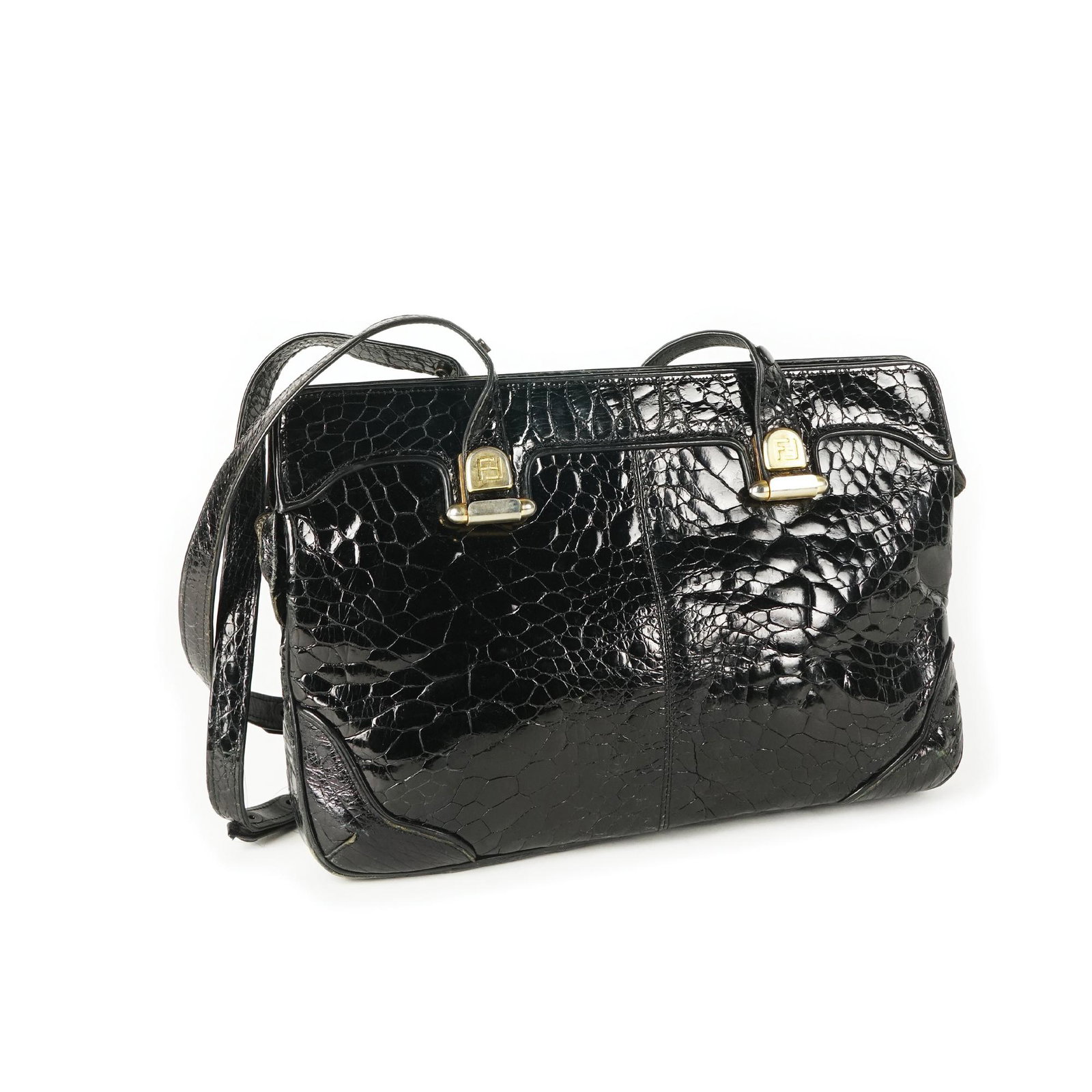 Fendi: An exotic black leather shoulder bag, '80s, 23by34cm.