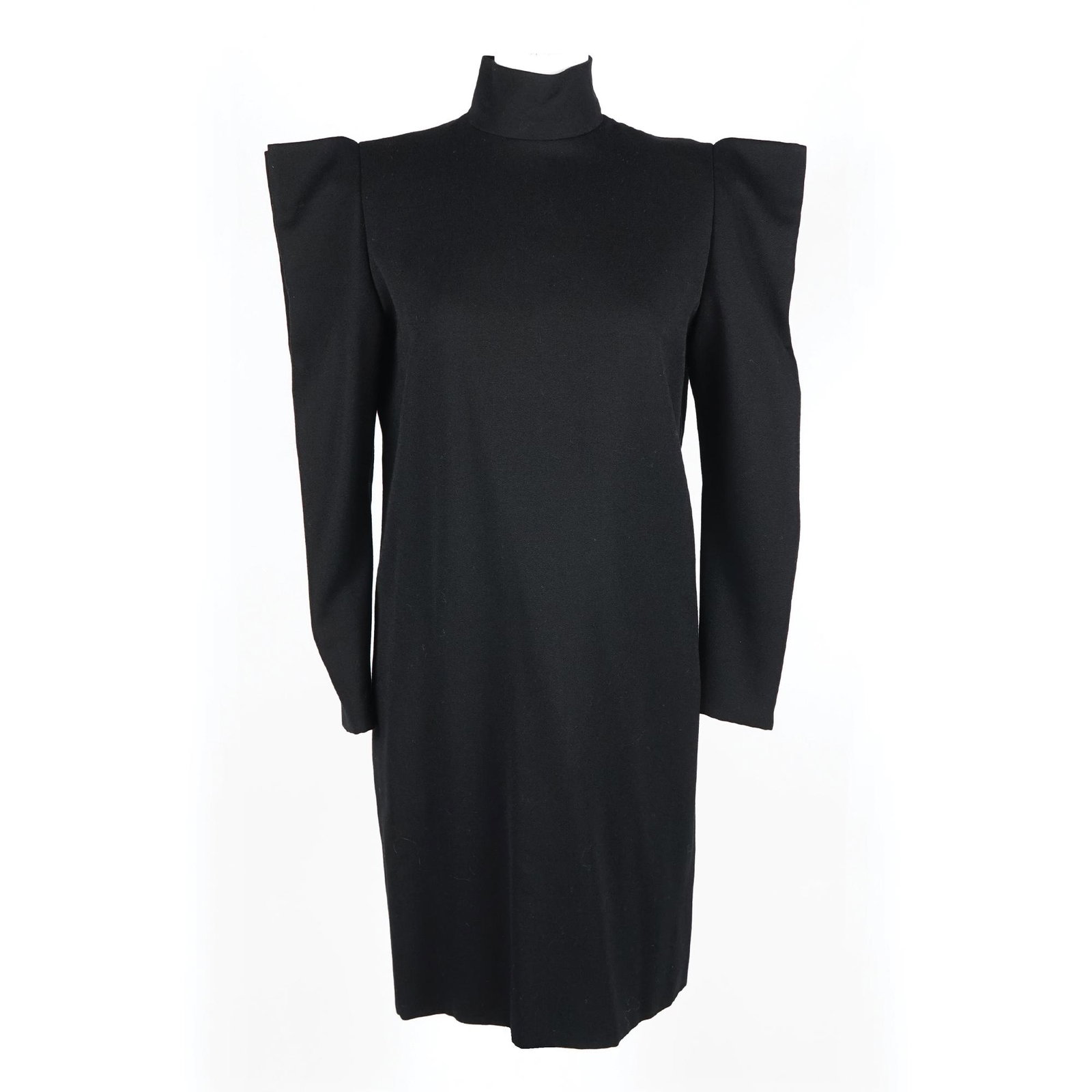 Pierre Cardin: a black wool dress with high collar and square sleeves