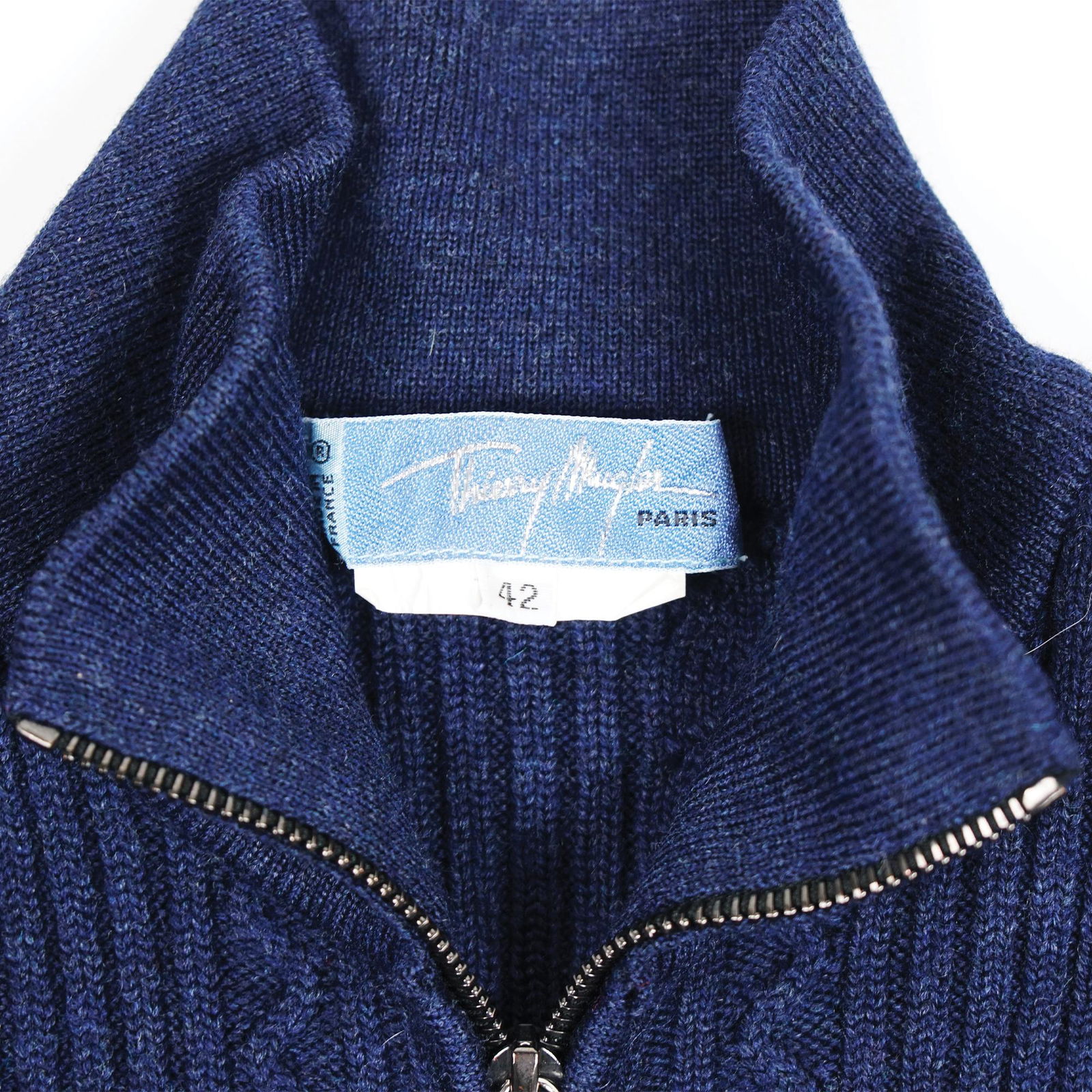 Thierry Mugler: blue wool jumpsuit with short-sleeves.'80, size 42