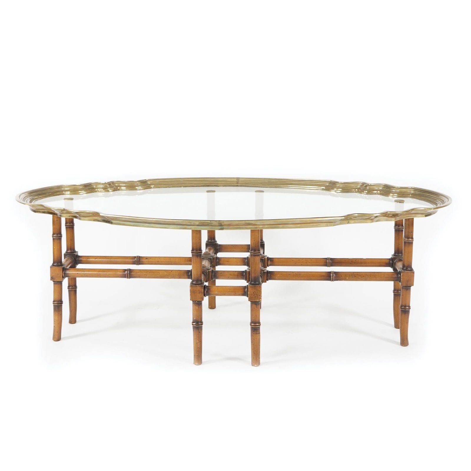 A sofa table with a brass framed glass top on a wooden base (1 of 1)